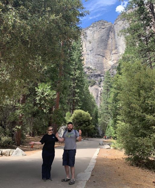 Morgan with her husband on a rock trail