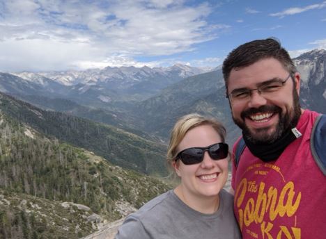 Morgan with her husband, with a mountain view